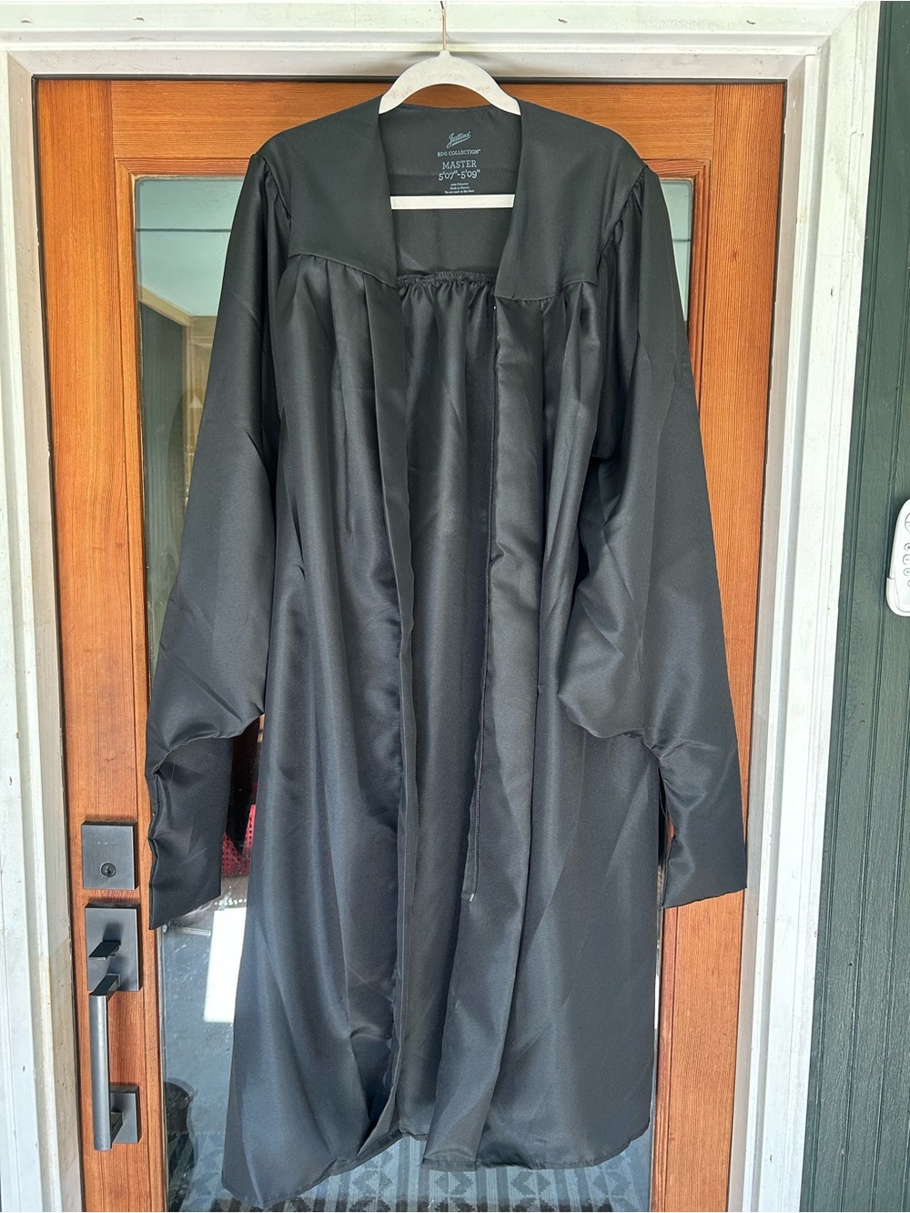 Jostenโs Masterโs Degree Cap & Gown